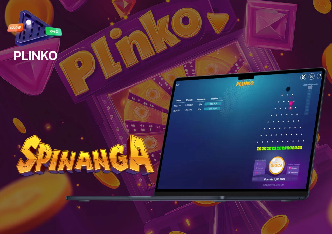 Plinko aperto su Spinanga, visibile su portatile con sfondo da casinò ricco di dettagli dorati